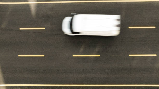 istock Vehicles on asphalt road imaging with long exposure technology 1953266549