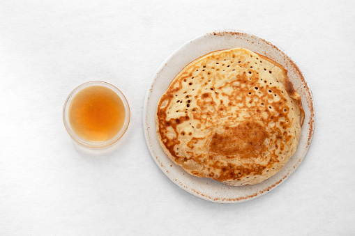 Homemade pancake and maple syrup