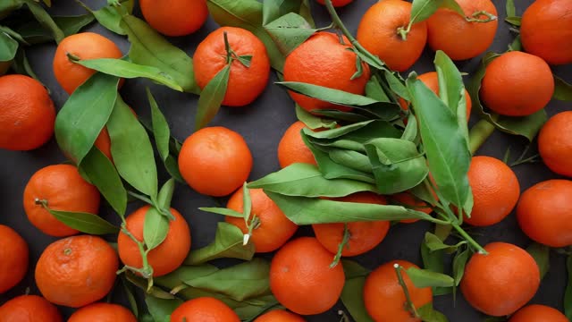 Mandarins fall in slow motion