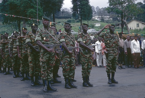 Cameroon (unfortunately the exact location is not known), 1967. Cameroonian presidential guard during a state visit by a foreign head of state. Also: spectators.