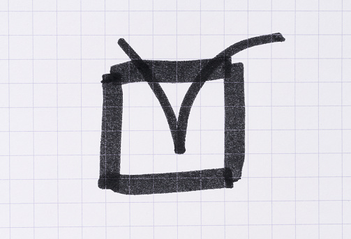 A square drawn with a black marker and a checkmark on a checkered sheet