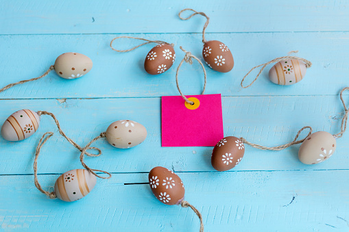 Easter eggs on a blue wooden background