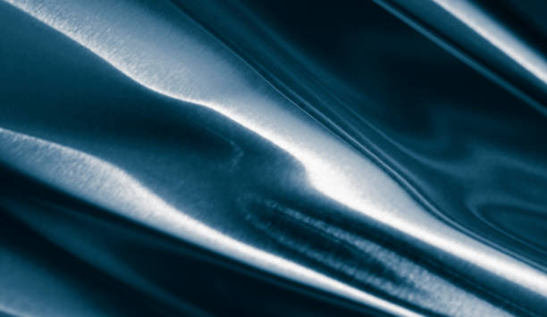 istock blue bent metal sheet with visible texture. background 1953353366
