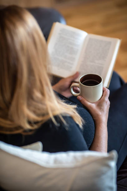 istock An unrecognizable  woman reading a book 1953434973
