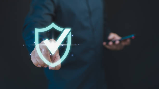 istock Customer hand touch the identity proof icon for security protection system on virtual screen. Quality assurance of business service. Certified guarantee approval or secure access system concept. 1953483030