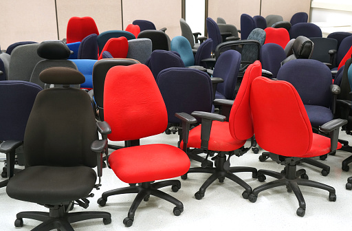 different chairs in the office storage room