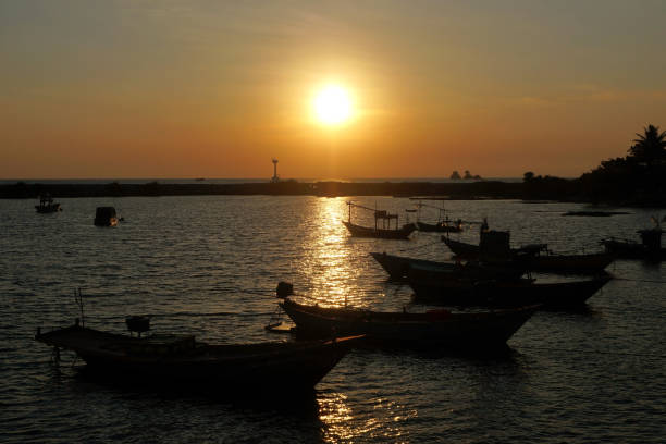 fishing boat in the sea stock photo