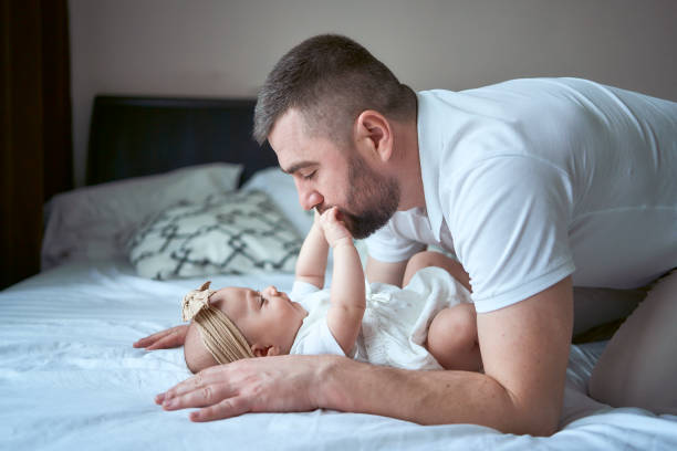 istock father plays with his daughter 1953681320