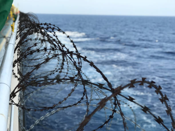 istock Vessel hardening is done with razor wire and wire fencing 1953740601