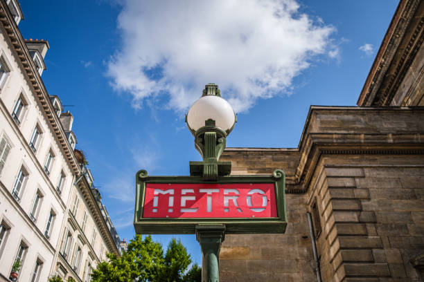 istock Red Metro Sign Against Blue Sky 1953741791