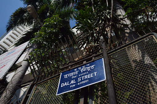 Mumbai, Maharashtra, India - 10 October 2021, Picture of street sign board named 'Dalal Street'- Financial Center of India where BSE(Bombay Stock Exchange) is located a famous stock exchange,  market.