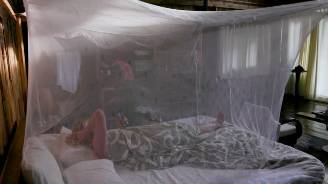 woman bug screen bed