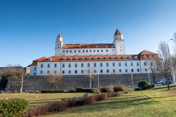 Bratislava, Slovakia - July 10,2025.  Panoramic photo of the Bratislava castle. Blue sky with clouds at the background.
