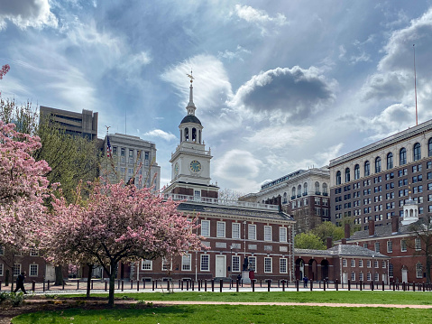 Independence Hall is an iconic landmark where the American Declaration of Independence was signed in 1776. During spring time, the trees blossom around its garden. Independence Hall is a popular tourist destination in Philly.