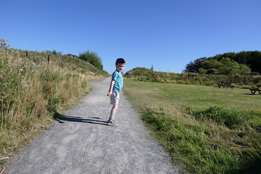 A child walking up a lane in the UK