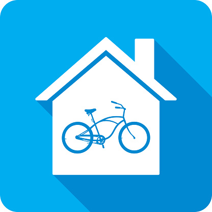 Vector illustration of a house with bicycle icon against a blue background in flat style.