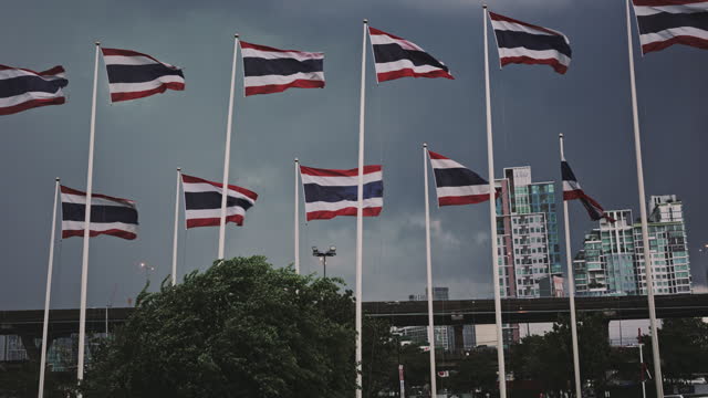 Thai flag and clouds during heavy rain