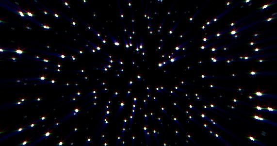 Abstract cosmic background of energetic bright glowing magical stars on a dark sky background.