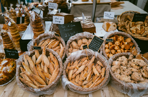 December 23, 2023, Cahors, France:Local pastry for sale at the weekend market. Street markets in Cahors are held every Wednesday and Saturday. Local people and tourists come along to buy local produce on the bustling stalls.