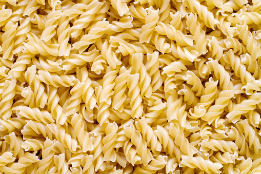 Spiral pasta. Texture of natural raw pasta.