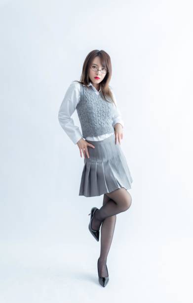 istock A young Asian school girl standing with hands on hips 1954173611