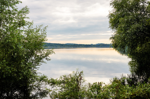 View of the Möhnesee and the surrounding landscape in the evening. Nature near Körbecke.