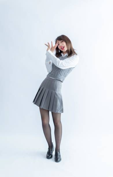 istock Asian school girl posing 1954180012