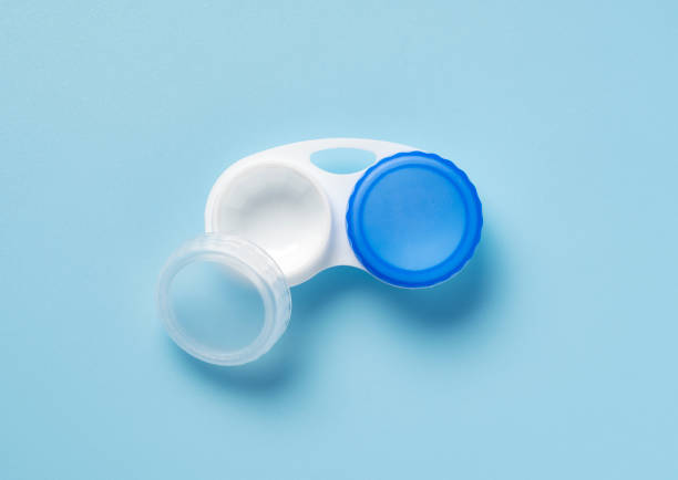 istock Case of contact lenses placed on a blue background. View from above. 1954180542