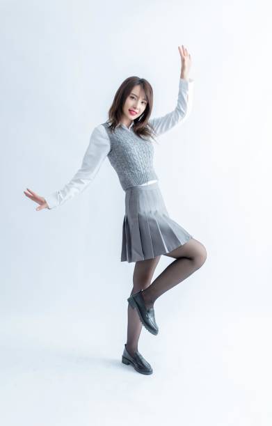 istock Asian school girl in uniform posing 1954192065