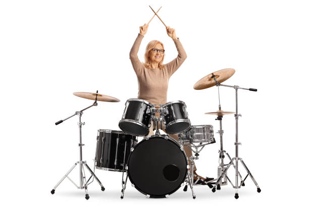 istock Woman playing drums isolated on white background 1954194165