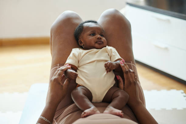 istock Mother Playing with Baby after Workout 1954197891
