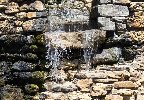 Water flows over the stones.