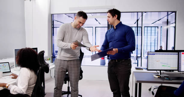 istock Men Argue At Workplace. Business Conflict 1954208606