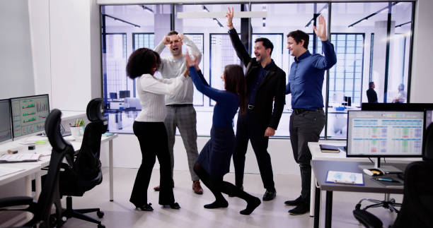 istock Diverse Excited People Business Group Celebrate 1954208622