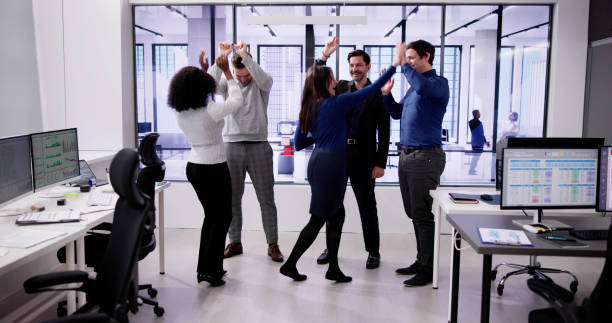 istock Diverse Excited People Business Group Celebrate 1954208625