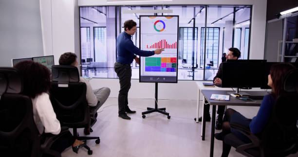 istock Diverse Team Meeting With TV Screen 1954208665
