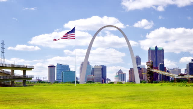 Gateway Arch and American Flag. St. Louis.