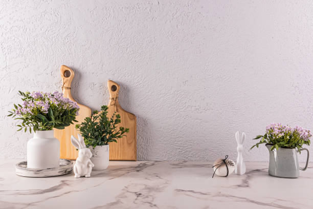 istock Stylish kitchen background for Easter holiday with traditional symbols and white tableware. foreground. Easter holiday concept. A copy space. 1954238018