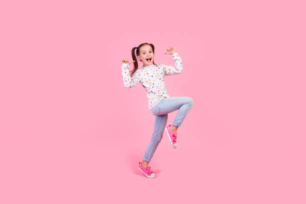 istock Full size photo of overjoyed nice schoolgirl dressed dotted pullover denim pants directing at herself isolated on pink color background 1954253354