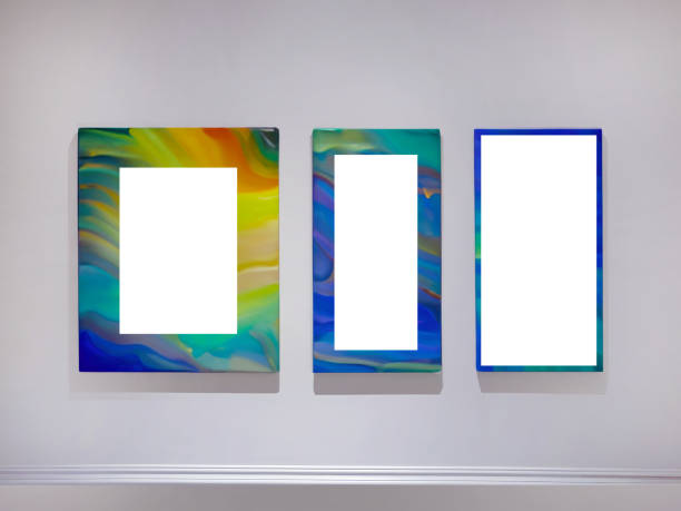 istock Three empty vertical picture frames hanging on white wall, Wall art mockup set of 3 posters, blank space frame modern interior style, minimalist with clipping path 1954264217
