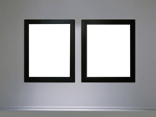 istock Two empty vertical picture frames hanging on white wall, Wall art mockup, blank space frame modern interior style, minimalist with clipping path 1954264244