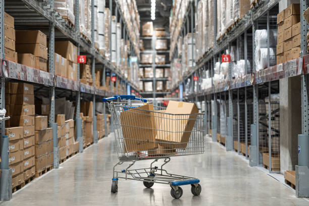 istock Shopping cart in the warehouse 1954343524