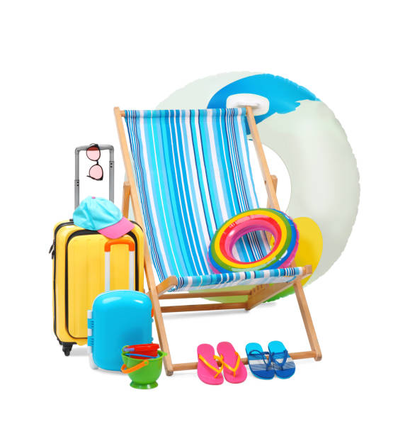istock Deck chair, inflatable ring, suitcases and beach accessories isolated on white 1954353339