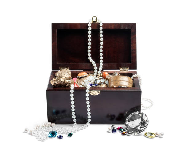 A golden treasure chest on a white background with clipping path.