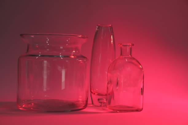 Empty glass jar isolated on white background