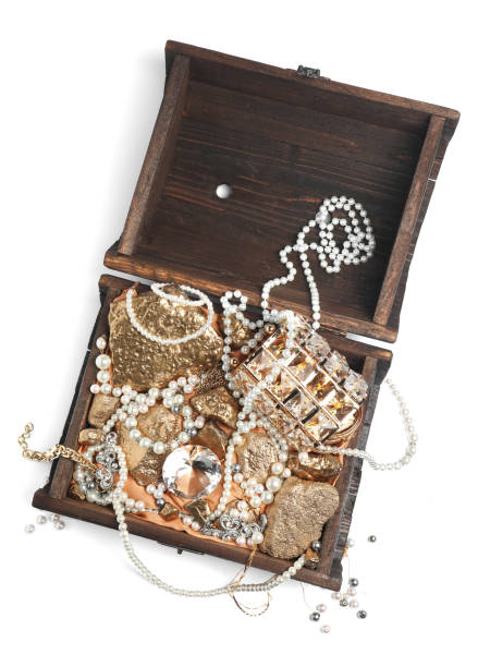 Wooden chest with treasures isolated on white, top view