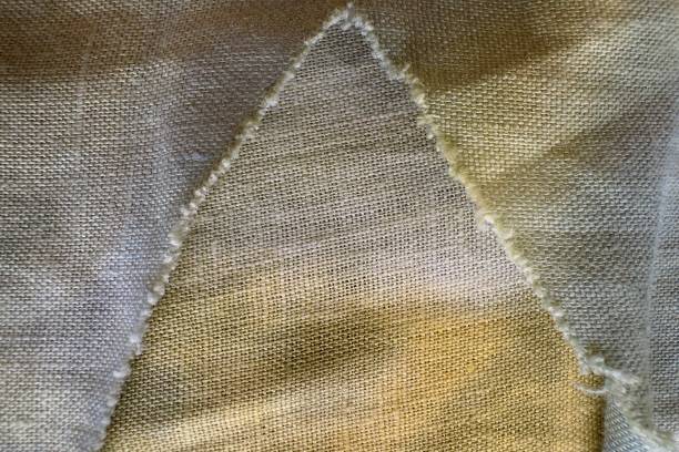 istock Colorful fablic conton thai handcraft peruvian style rug surface old vintage torn conservation Made from natural materials chemical free close up 1954382523
