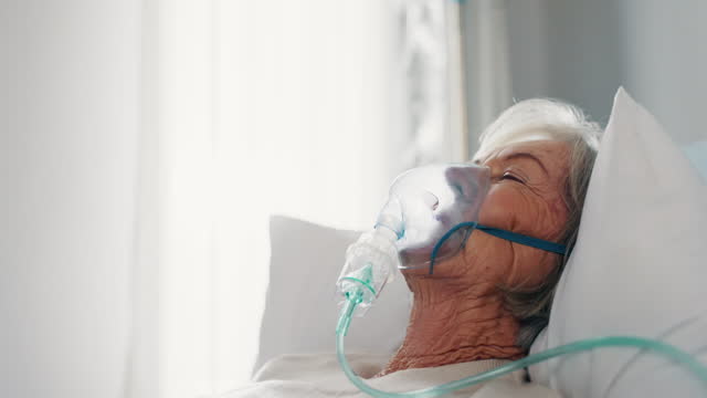 Old woman, healthcare and oxygen mask, sick with elderly care in hospital or nursing home with health problem. Female person, medical treatment for cancer or lung disease, senior patient and medicine
