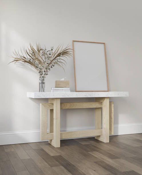 istock Mockup frame, poster empty in home design on top marble wood leg console,modern interior design element mockup, 3d rendering. 1954425937
