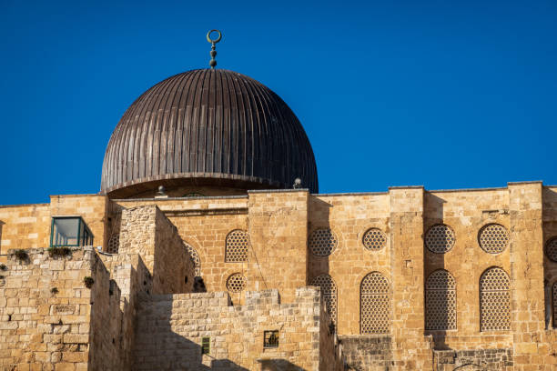 Al-Aqsa Mosque seen from the Western Wall under blue sky, Jerusalem, Israel